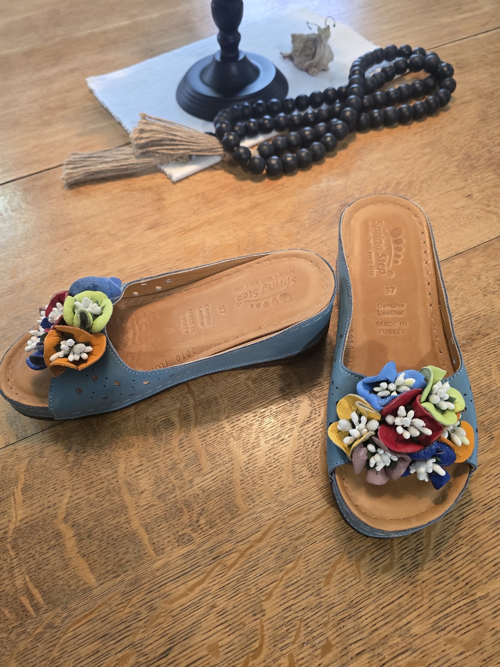 Spring Step Blue Leather Slide Mules with Multicolor Floral Embellishments
